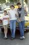 Both the young and old versions of William pose with director Cameron Crowe